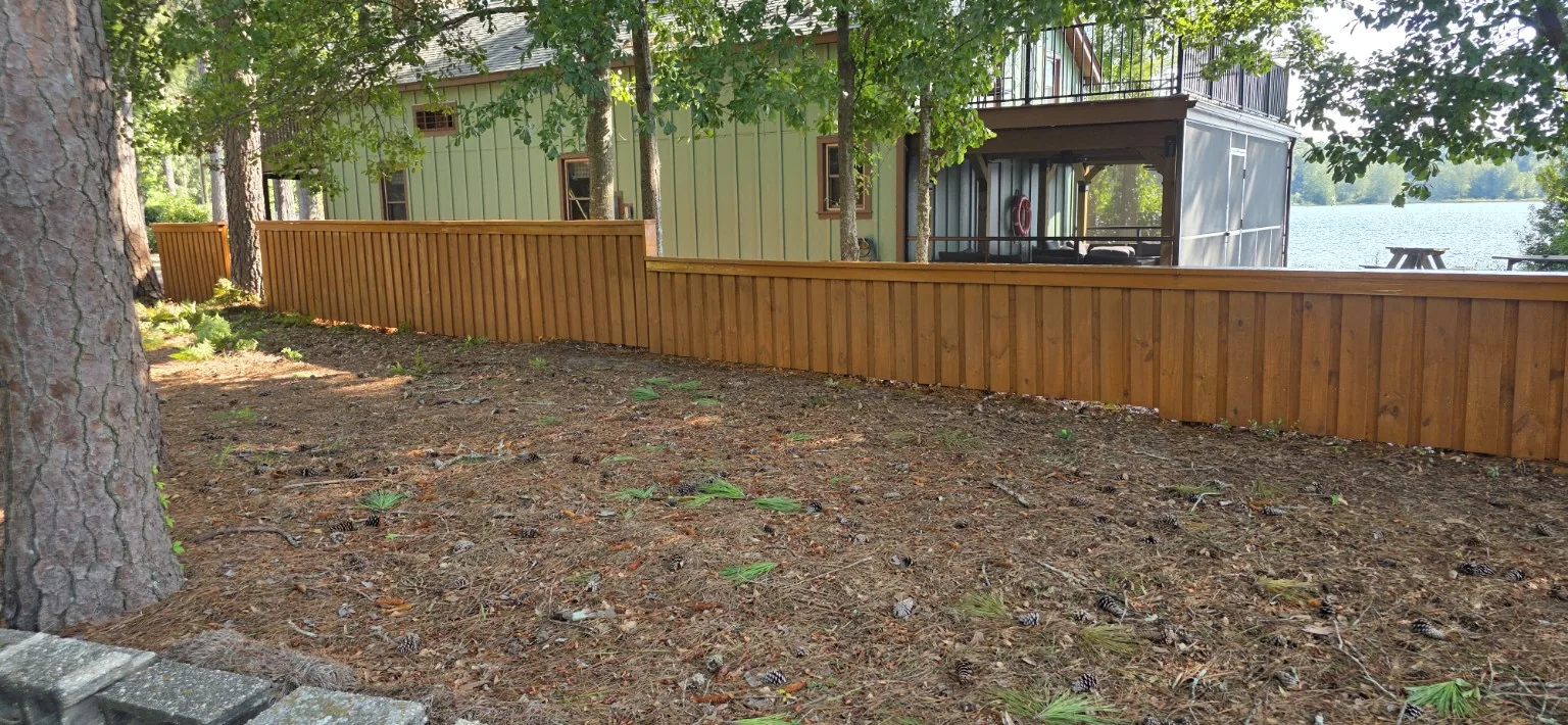 Decorative stained wood fencing